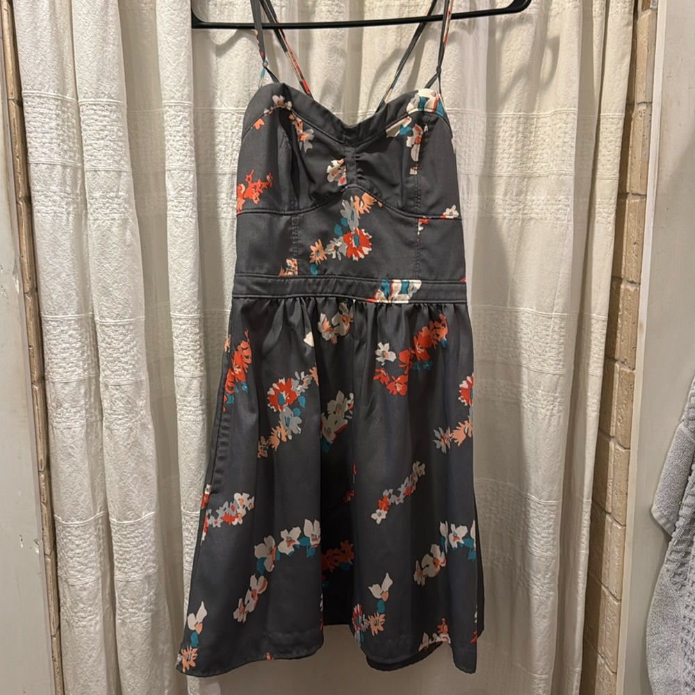 Cute short strappy versatile dress.